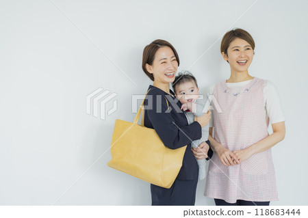 Working mothers and childcare workers Working mothers and childcare workers 118683444