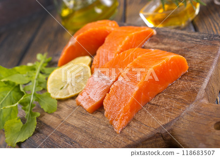 raw salmon with fresh lemon and salt raw salmon with fresh lemon and salt 118683507