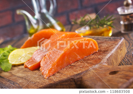 raw salmon with fresh lemon and salt 118683508