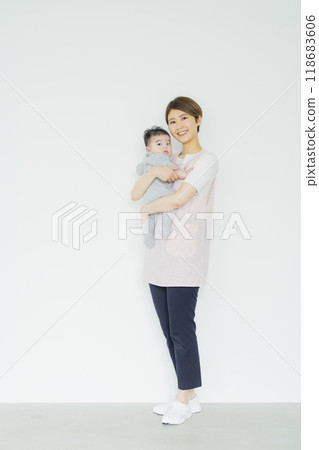 Child nurse holding a baby 118683606