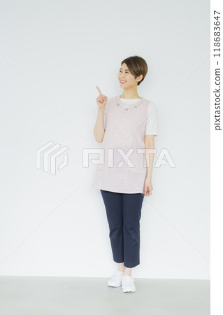 Nursery teacher, woman in apron 118683647