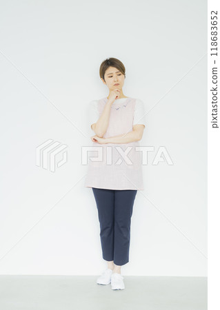 Nursery teacher, woman in apron 118683652