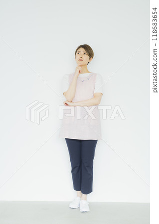 Nursery teacher, woman in apron 118683654