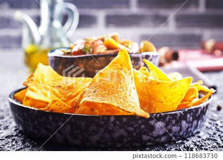 Nachos with guacamole and vegetables. Nachos with guacamole and vegetables. 118683730