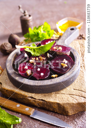 Fresh sliced beetroot salad with nuts and parsley Fresh sliced beetroot salad with nuts and parsley 118683739