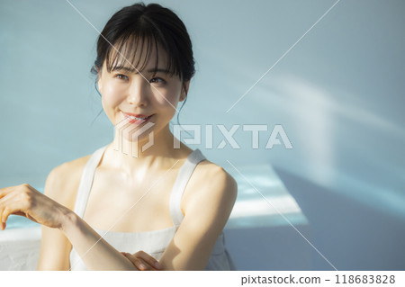 Woman taking care of her body Woman taking care of her body 118683828