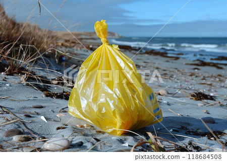 a plastic packaging, in the beach coast, pollution, garbage. 118684508