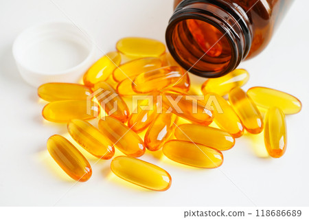 Fish oil or Cod liver oil gel in capsules with omega 3 vitamins, supplementary healthy food. 118686689