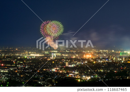Cityscape and fireworks display seen from the Aso mountain range (single shot) "Etsu Lake Fireworks Display (Kumamoto City)" Cityscape and fireworks display seen from the Aso mountain range (single shot) "Etsu Lake Fireworks Display (Kumamoto City)" 118687465