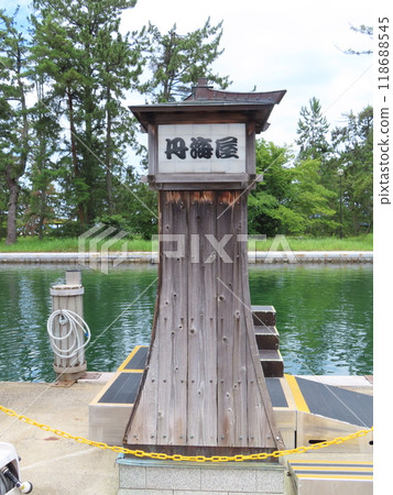 Lanterns at a sightseeing boat dock in the pine forest of Amanohashidate, one of the Three Most Scenic Spots of Japan Lanterns at a sightseeing boat dock in the pine forest of Amanohashidate, one of the Three Most Scenic Spots of Japan 118688545
