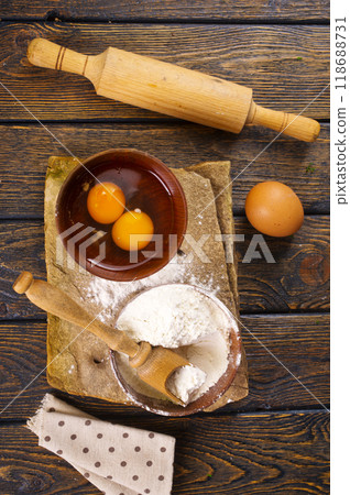 Baking background. Ingredients, kitchen utensils for baking cakes and cookies. Baking background. Ingredients, kitchen utensils for baking cakes and cookies. 118688731