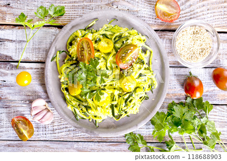 Raw Green Organic Zucchini Noodles Raw Green Organic Zucchini Noodles 118688903