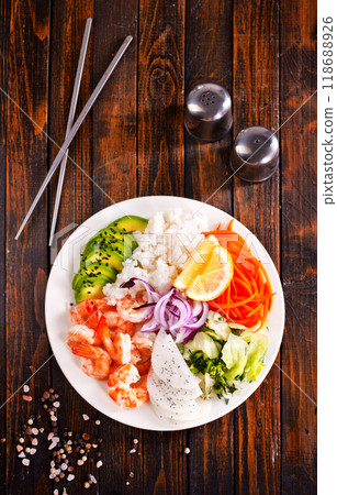 Poke bowl and ingredients on wooden table, Poke bowl and ingredients on wooden table, 118688926