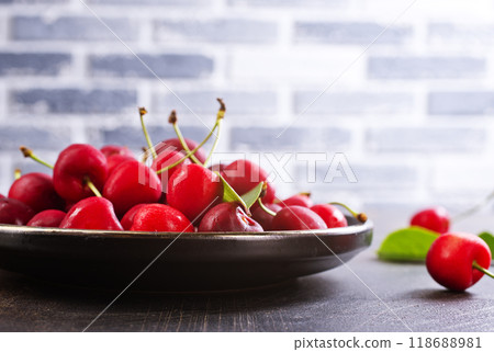 Freshly harvested cherries in a bowl. Fresh sweet organic cherries 118688981
