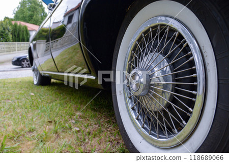 Mazelos, Portugal, September 20, 2023 - Close-up of a wheel of a retro Chevrolet car at an exhibition in Portugal. 118689066