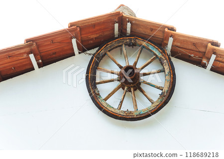 decor rustic style wooden cart wheel under the roof of the house decor rustic style wooden cart wheel under the roof of the house 118689218