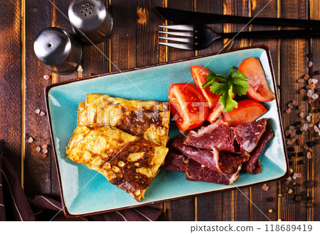 Omelette rolls with ham and cheese. Healthy breakfast. Omelette rolls with ham and cheese. Healthy breakfast. 118689419