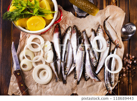 Salted Baltic fish with potato and onion Salted Baltic fish with potato and onion 118689443