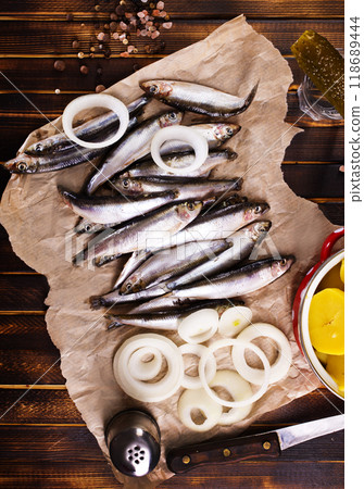 Salted Baltic fish with potato and onion 118689444