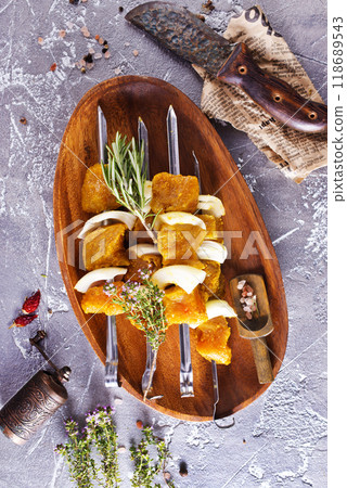 raw kebab with vegetables. On a stone background raw kebab with vegetables. On a stone background 118689543