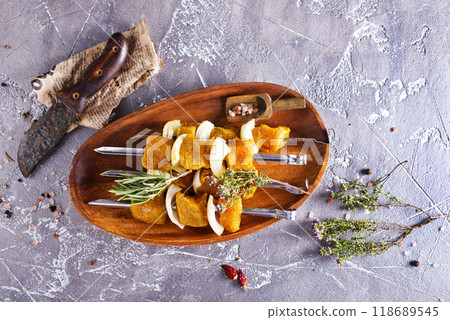 raw kebab with vegetables. On a stone background raw kebab with vegetables. On a stone background 118689545
