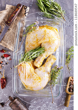 Raw chicken leg quarters 118689547