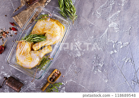 Raw chicken leg quarters 118689548