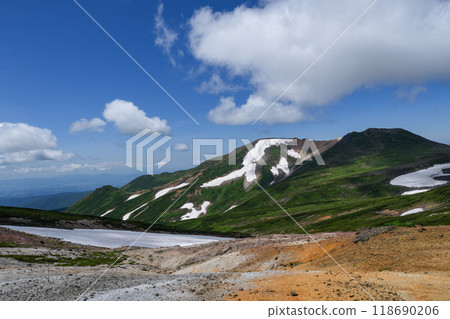 Climbing Mt. Daisetsuzan Aibetsudake from Ohachidaira - A spectacular view of the remaining snow in Hokkaido Climbing Mt. Daisetsuzan Aibetsudake from Ohachidaira - A spectacular view of the remaining snow in Hokkaido 118690206