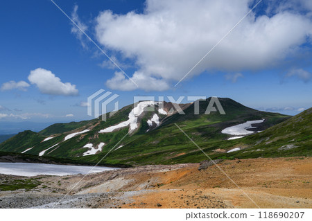 Climbing Mt. Daisetsuzan Aibetsudake from Ohachidaira - A spectacular view of the remaining snow in Hokkaido Climbing Mt. Daisetsuzan Aibetsudake from Ohachidaira - A spectacular view of the remaining snow in Hokkaido 118690207