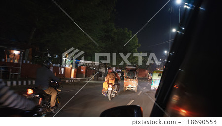 Jaipur, Rajasthan, India. Auto Rickshaw Or Tuk-tuk, Motorcycles Drive By Street In . Busy Traffic In City Street. Night City Life. Night Trade At Street. People Walk By Street. Men Rides Motorcycles 118690553