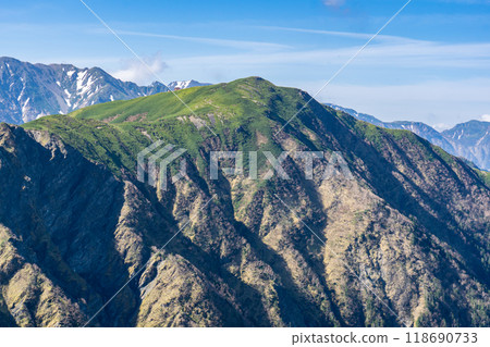 Climbing Mt. Ogouchi in the Southern Alps in early summer - Mt. Ogouchi seen from the summit of Mt. Eboshi Climbing Mt. Ogouchi in the Southern Alps in early summer - Mt. Ogouchi seen from the summit of Mt. Eboshi 118690733