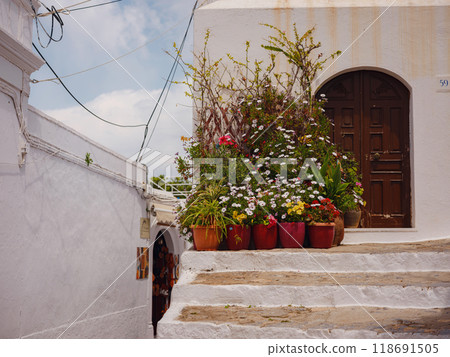 travel to city of Lindos on island of Rhodes, Greece. Details of streets of old town Lindos. Interesting elements of door, shutters, bas-relief of walls. tourist attraction on island of Rhodes travel to city of Lindos on island of Rhodes, Greece. Details of streets of old town Lindos. Interesting elements of door, shutters, bas-relief of walls. tourist attraction on island of Rhodes 118691505