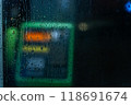 Public phone on rainy day 118691674
