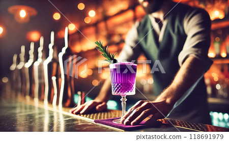 Close-up shots of a bartender's hand gently placing a purple cocktail onto a marble bar counter. The drink is served in an elegant martini glass with delicate garnishes, set against the backdrop of a 118691979