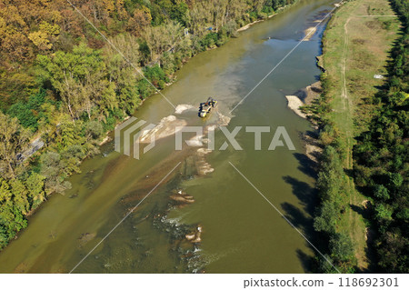 Sand and gravel exploitation in the river aerial view Sand and gravel exploitation in the river aerial view 118692301