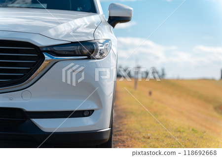 white SUV type passenger car 118692668