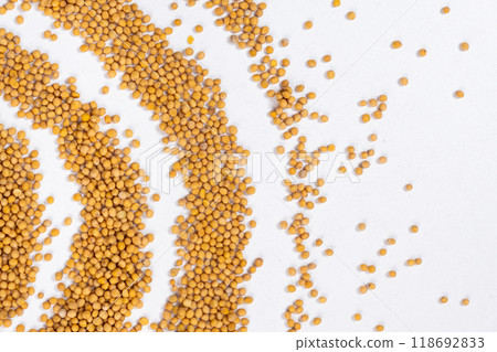 Scattered Dry Yellow Mustard Grains on White Background Top View 118692833