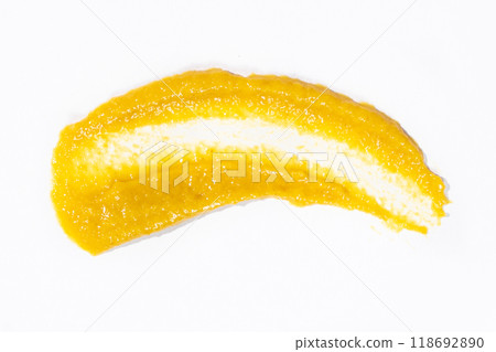Smear of mustard sauce on white background isolate, creativity in cooking, macro texture 118692890