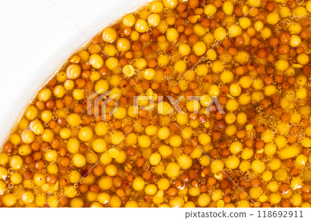 French Dijon mustard background, close-up, top view. 118692911