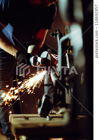 Motorcycle repair. Disassembled motorcycle. Fixing motorcycle standing in repair shop. Motorcycle repair. Disassembled motorcycle. Fixing motorcycle standing in repair shop. 118692957