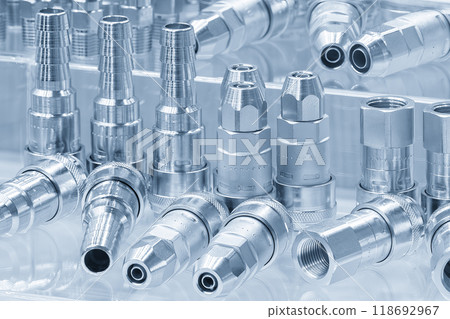 Close up scene the set of pipe connector parts in the light blue scene. Close up scene the set of pipe connector parts in the light blue scene. 118692967