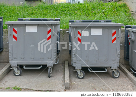 Two Metal Dumpster Bins Two Metal Dumpster Bins 118693392