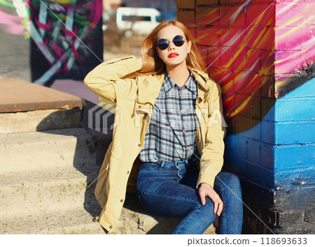 Fashion portrait blonde pretty young woman in city over colorful background 118693633