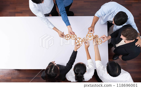 Business team joining cogwheel in circular together. Prudent 118696001