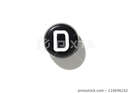 Close-up of vintage typewriter key with shadow on white background Close-up of vintage typewriter key with shadow on white background 118696282
