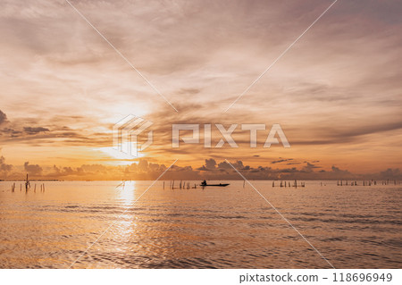 Morning scene of village fish net in Songkhla lake, Phatthalung, Thailand. Morning scene of village fish net in Songkhla lake, Phatthalung, Thailand. 118696949