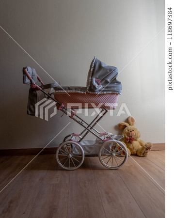 Antique baby stroller Antique baby stroller 118697384