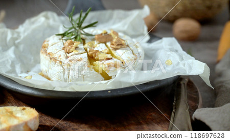 Fresh sliced Camembert cheese 118697628