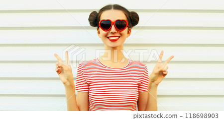 Portrait of happy smiling young woman with cool hairstyle on white background 118698903