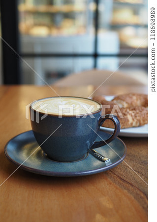 Stylish Coffee and Pastry Setup in Modern Caf 118698989